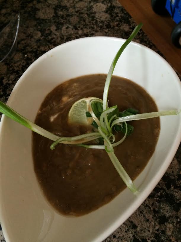 scallion garnish with lentil soup