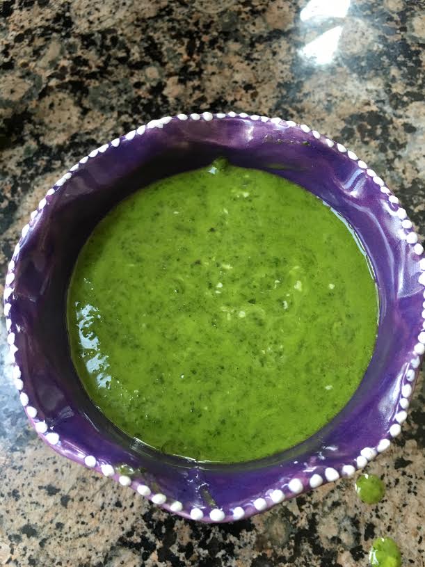 pesto sauce in purple container