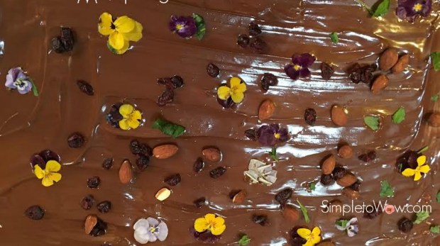 chocolate bark with nut mint and pansies up close with logo
