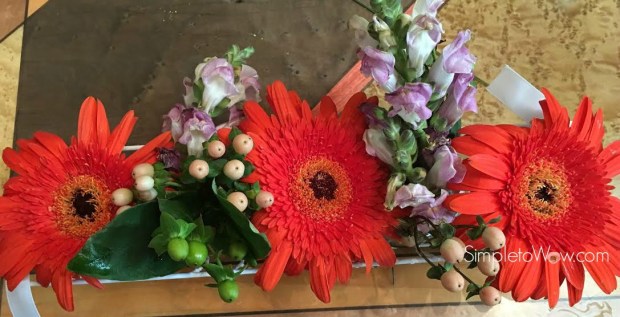 upcycled floral arrangement-gerber daisies in sequence