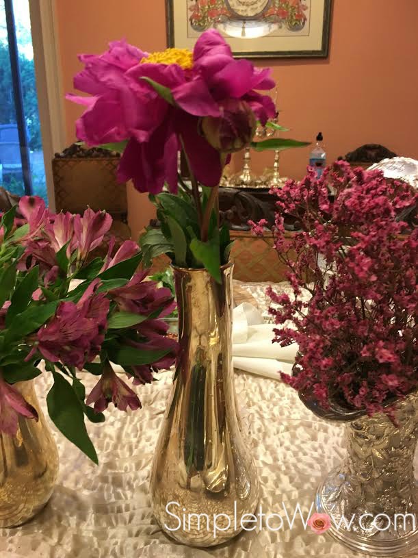 A Trio of Magenta Flowers in Vintage Silver Vases