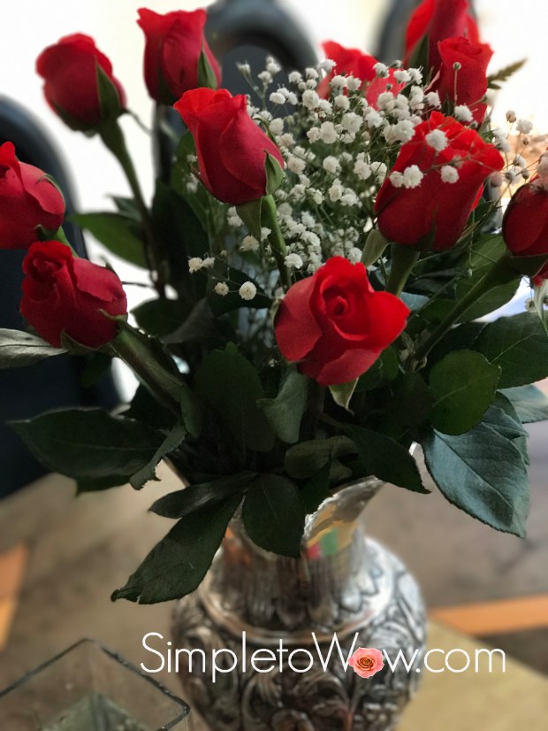 simpletowow roses in antique silver vase