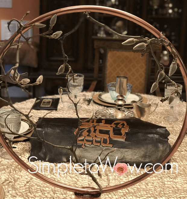 shabbos table through copper hoop arrangement