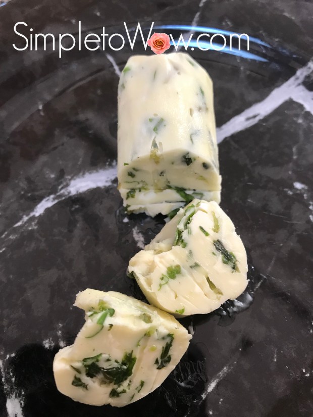 basil butter log cut into pieces.jpg